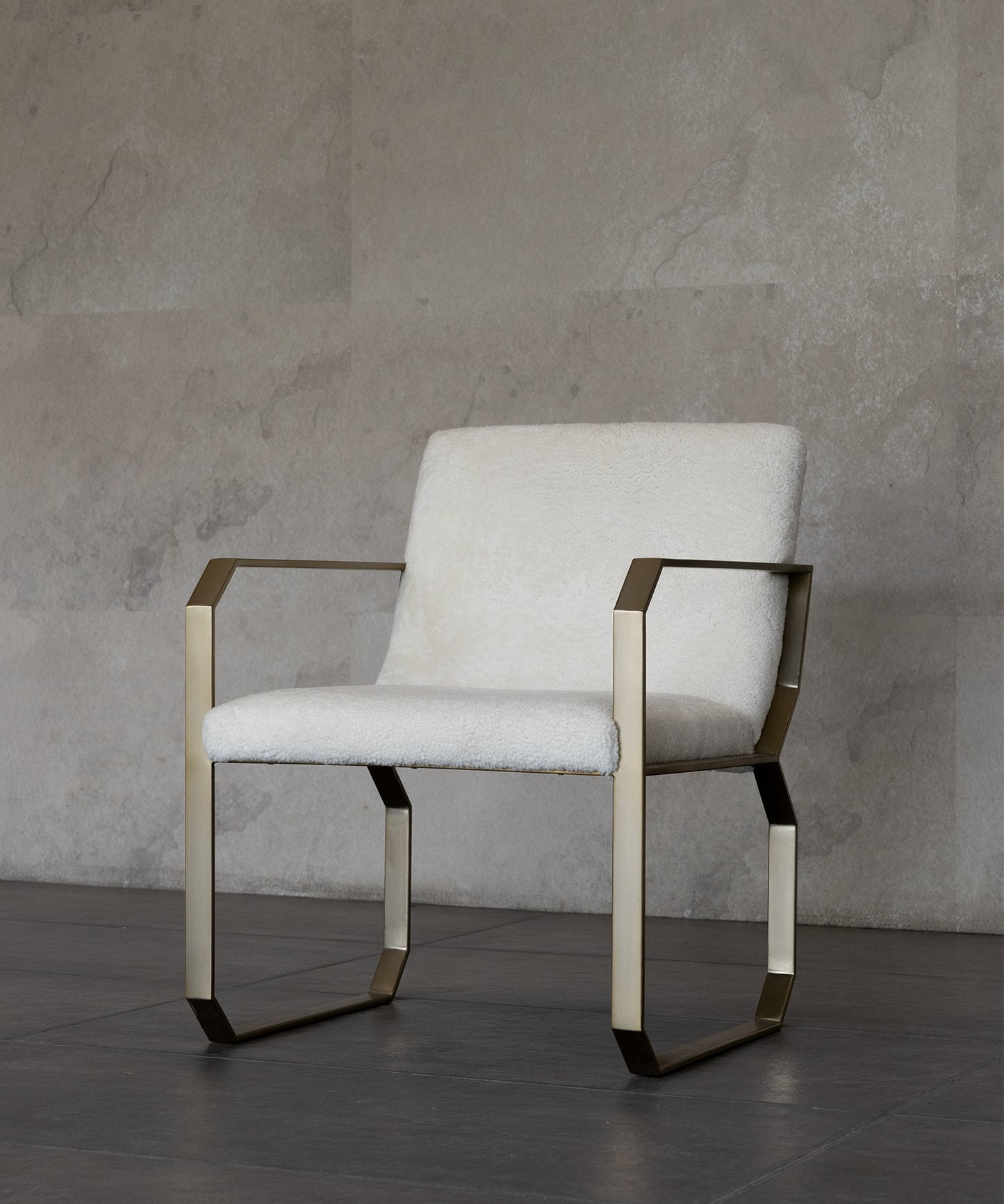 DIP DINING CHAIR | CREAM SHEARLING