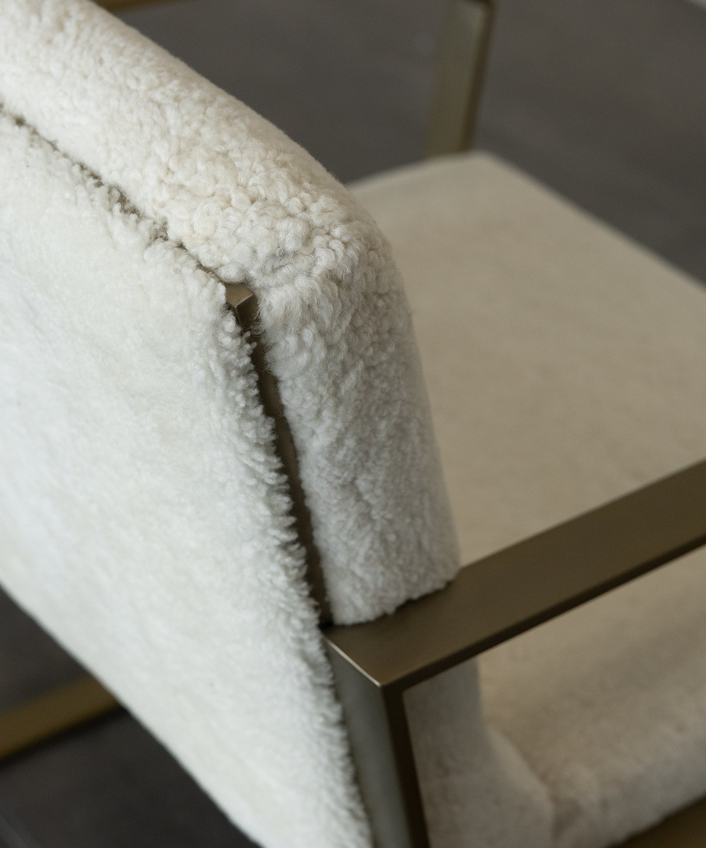 DIP DINING CHAIR | CREAM SHEARLING